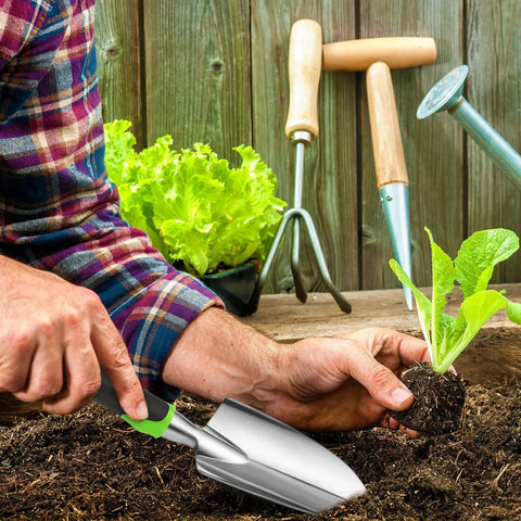 Gardener using Heavy Duty Aluminum Garden Shovel and Trowel Set with Soft TPR Handle for planting