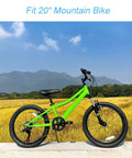 Green mountain bike fitted with Heavy Duty 20 Inch Bike Inner Tubes Kit 2 Pack for 20x2.125 to 2.40 in a field.