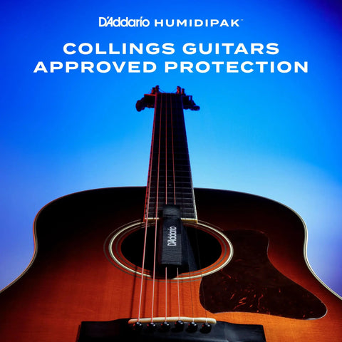 Humidipak Guitar Humidity Control Kit For Cases Keeps Your Axe Safe From Warping With A Maintenance Free Two Way Humidity System Including Pouches And Humidifier Packs. acoustic guitar with humidipak in body opening