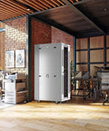 Heavy Duty 32U Server Rack Workhorse With Ventilated Mesh Door in a modern office setting with wooden floor.