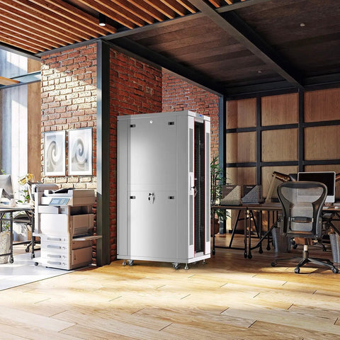 Heavy Duty 32U Server Rack Workhorse With Ventilated Mesh Door in a modern office setting with wooden floor.