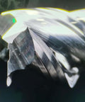 Carbide end mill with 1/4-inch shank and three flutes for aluminum or copper, close-up view.