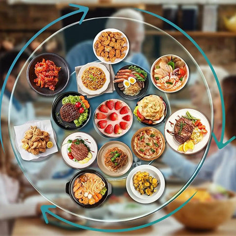 Large Round Lazy Susan With Solid 360 Smooth Spin Heavy Duty Tempered Glass Turntable Tray with various dishes for sharing.