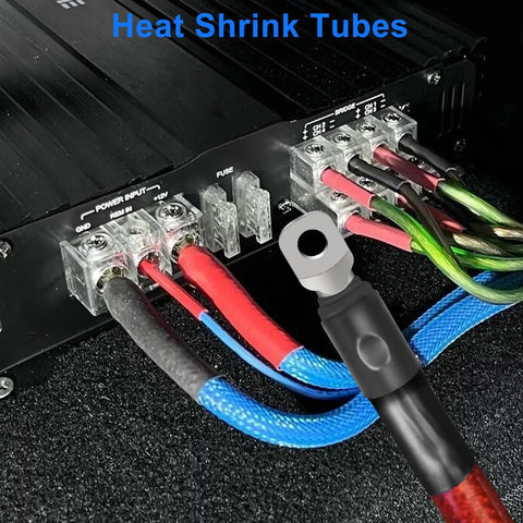 Beefy 0 Gauge Wire Terminal Connectors Kit With 1/0 AWG Car Battery Cable Butt Connectors setup on amplifier, heat shrink tubing visible