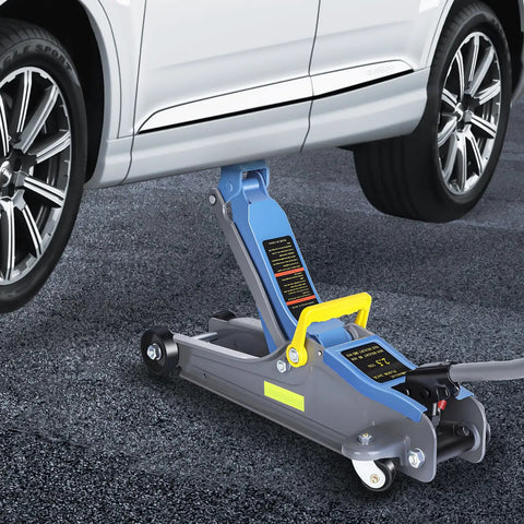 2.5 Ton Heavy Duty Hydraulic Floor Jack With Low Profile Design lifting a car, blue gray jack with reflective tape
