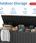 85 Gallon Outdoor Storage Box Resin Deck Box Waterproof UV Resistant With Reinforced Stability For Patio Garden And Poolside Striped Black Built To Last Storage For Cushions Toys And Tools open with items inside.
