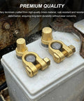 Slick SAE To JIS Battery Terminal Converters 2 Piece Quick Release Top Post Clamps on a battery, showcasing brass resilience.