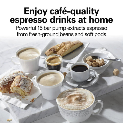 15 Bar Espresso Machine For Sippin Straight Up Lattes And Creamy Cappuccinos With Dual Auto Frother Brews Two Cups At Once Compatible With Pods Or Grounds 50 Oz Tank Black with cappuccinos and pastries on marble surface.