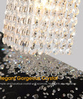 Gold Crystal 3 Light Vanity Wall Sconce for Bathroom Home with crystal beads chain close-up view.
