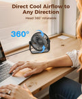 USB Desk Fan Portable Mini Personal Fan with 360 Degree Head on a desk, person typing nearby