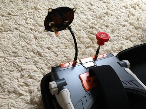 FPV goggles with attached 5.8GHz FPV Triple Feed Patch Antenna With 9.4dBi Gain, SMA Male To SMA Male Cable Adapter
