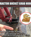 Two Pack Grade 70 Forged Steel Three Eighths Inch Tractor Bucket Grab Hooks With Backer Plate And Mounting Hardware installed on tractor