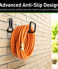Heavy Duty Garden Hose Holder Wall Mount Built Tough Steel Hose Hanger with hook holding orange hose on brick wall