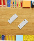 Pack Of 10 Heavy Duty Metal Tape Gun Blades Replacement For 4 To 5 Cm Packing Tape Dispensers Serrated Cutter Blades close-up on wood