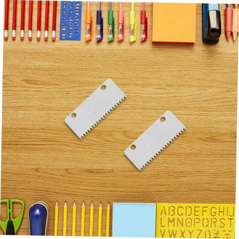 Pack Of 10 Heavy Duty Metal Tape Gun Blades Replacement For 4 To 5 Cm Packing Tape Dispensers Serrated Cutter Blades close-up on wood