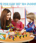 Children playing with Epic 170 Piece Building Set For Kids Ages 3 To 9 With Toy Box Storage And Idea Guide at a table.