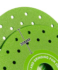 Close-up of green Ultra Thin 0.05 Inch Diamond Grinding Disc For Angle Grinder 4.5 Inch with 30mm spacing.