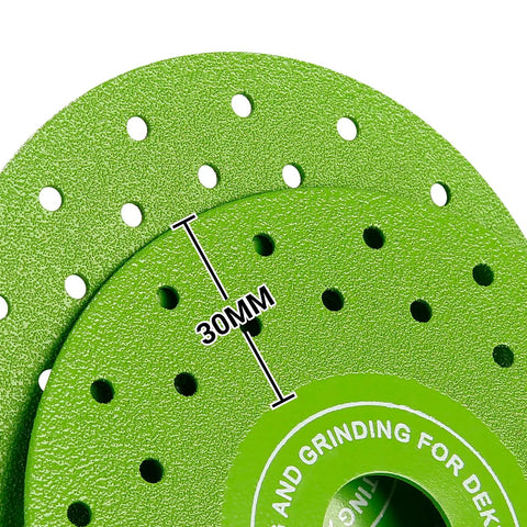 Close-up of green Ultra Thin 0.05 Inch Diamond Grinding Disc For Angle Grinder 4.5 Inch with 30mm spacing.