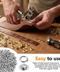 Person using Heavy Duty Metal Grommets Kit 1000 Pieces Three Eighths Inch Eyelets and Washers for leather crafting