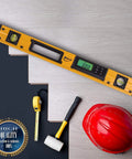 24 Inch Digital Level With Slope Readings For Degrees And Percent Electronic Level Tool With Pro Grade Precision IP54 Dustproof Waterproof Includes Batteries And Case For Pros And DIY Projects shown with tape measure, mallet, and hard hat on a work surface.