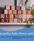 Top Shelf 3/4 Inch Solid Birch Wood Blocks 100 Pack Unfinished Smooth Craft Cubes displayed as personalized alphabet blocks.