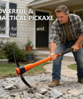 Man using Heavy Duty Pickaxe For Digging With Shock Absorbing Handle 36 Inches Durable Manganese Steel Head For Hard Ground Rocks And Roots Built For Tough Jobs And Long Lasting Performance A Real Workhorse On Any Job Site in rocky yard.