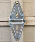 Two Eighteen Gauge Narrow Body Garage Door Hinges In Cold Rolled Steel With Galvanized Finish Replacement Hardware installed view