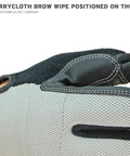 Close-up of gray Kevlar cut resistant work gloves with brow wipe on thumb, designed for men, large size, DuPont lined for protection.