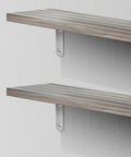 Heavy Duty Stainless Steel L Shaped Shelf Brackets 10 Pack With Pre Drilled Holes And Screws mounted on wood shelves