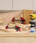 Slick Adjustable Juice Groove Router Jig With 8 Spacers And Four 1/4 Inch Shank Bits Straight Up Game Changing Woodshop Essential with clamps and router.