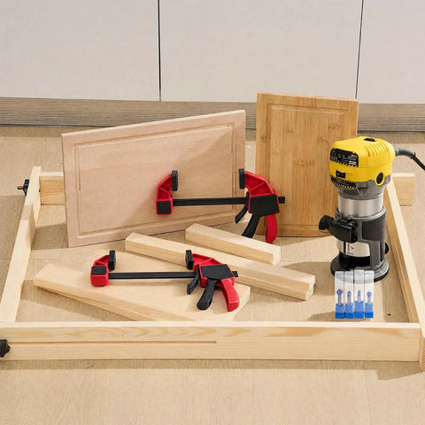 Slick Adjustable Juice Groove Router Jig With 8 Spacers And Four 1/4 Inch Shank Bits Straight Up Game Changing Woodshop Essential with clamps and router.