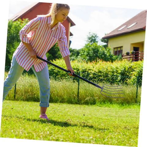 Woman using Multi Functional Manure Fork For Mulching And Garden Cleanup No Fuss Heavy Duty Handheld Grass Fork for yard work