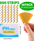Hand holding Ultimate 50 Pack pH Test Strips Kit 1 To 14 Universal Range Full Spectrum Litmus Paper, box and strip details visible.