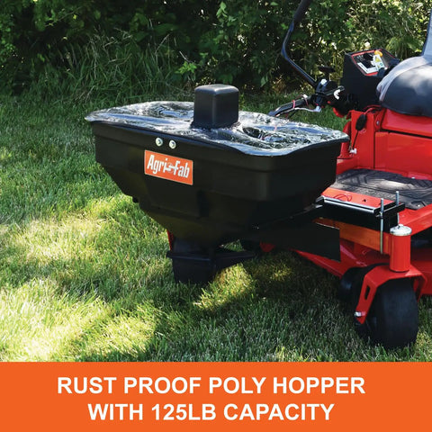 Zero Turn Mower Electric Spreader With 125 Lb Rustproof Poly Hopper on mower on grass