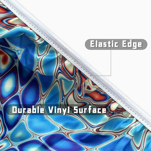 Close-up of blue round fitted tablecloth with elastic edge and waterproof vinyl surface.