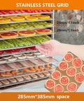 Image of the Smooth Operator 20 Layer Food Dehydrator Machine showcasing stainless steel grids with assorted dried fruits and vegetables.