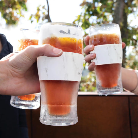 Freezable Insulated Pint Mugs Set Of 2 Double Walled Frosty Drink Glasses With Gel Core Keeps Beer And Cold Brew Icy Longer 16 Oz, hands holding chilled drinks outdoors.