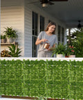 Artificial Ivy Privacy Fence Screen Set 120 By 40 Inches With 12 Pack 20 By 20 Inch Panels Vented Base Grid on patio railing