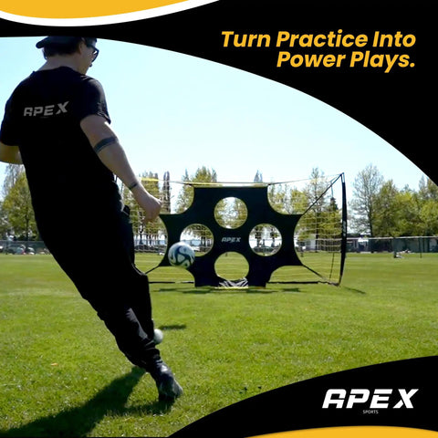 Person kicking a soccer ball towards 12x6 Ft Soccer Goal With Precision Target For Backyard Practice Game Ready Portable Net