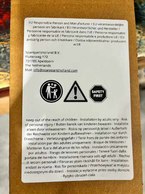 Warning label on product packaging showing multilingual safety instructions and safety icons.