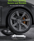 Car tire over Chrome Closed End Lug Nuts Set 32 Pieces 9/16-18 Thread for Ram Trucks, showing durability and strength