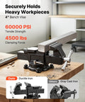 Built Like A Tank Heavy Duty Bench Vise With 4 Inch Ductile Iron Jaws And Full Rotary Swivel Base on wooden table.