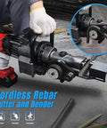Portable Cordless Electric Rebar Cutter And Bender, hydraulic handheld cutting tool with Li-Ion battery in use, cutting rebar.