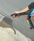 Person using Adjustable High Power Pressure Washer Gun With Swivel Length Options 37, 24, and 10 Inches for cleaning concrete wall.