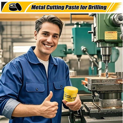 Front view of a worker in blue coveralls holding a yellow-lidded jar of industrial lubricating paste for drilling metal
