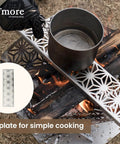 Portable Camping Fire Pit With Grill For Cooking, Outdoor Stove With Storage Bag, Backyard Patio Heater, shown with pot on top plate