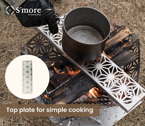 Portable Camping Fire Pit With Grill For Cooking, Outdoor Stove With Storage Bag, Backyard Patio Heater, shown with pot on top plate
