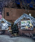 66Ft 200 LED Outdoor String Lights With Battery Pack And Remote Waterproof Fairy Lights adorning market stalls at night