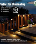 Top Shelf Solar Deck Lights 16 Pack, Slick Brown Shell Step Lights With Bright Warm White Glow illuminating a wooden deck railing.