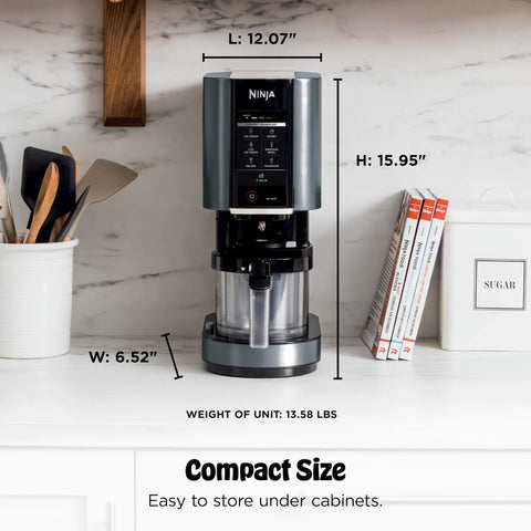 Ultimate Seven In One Frozen Treat Machine That Goes Hard On Cravings Includes One Touch Programs, shown in compact kitchen space.
